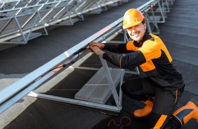 electrician-connecting-solar-panels-2021-09-02-01-01-24-utc (1)